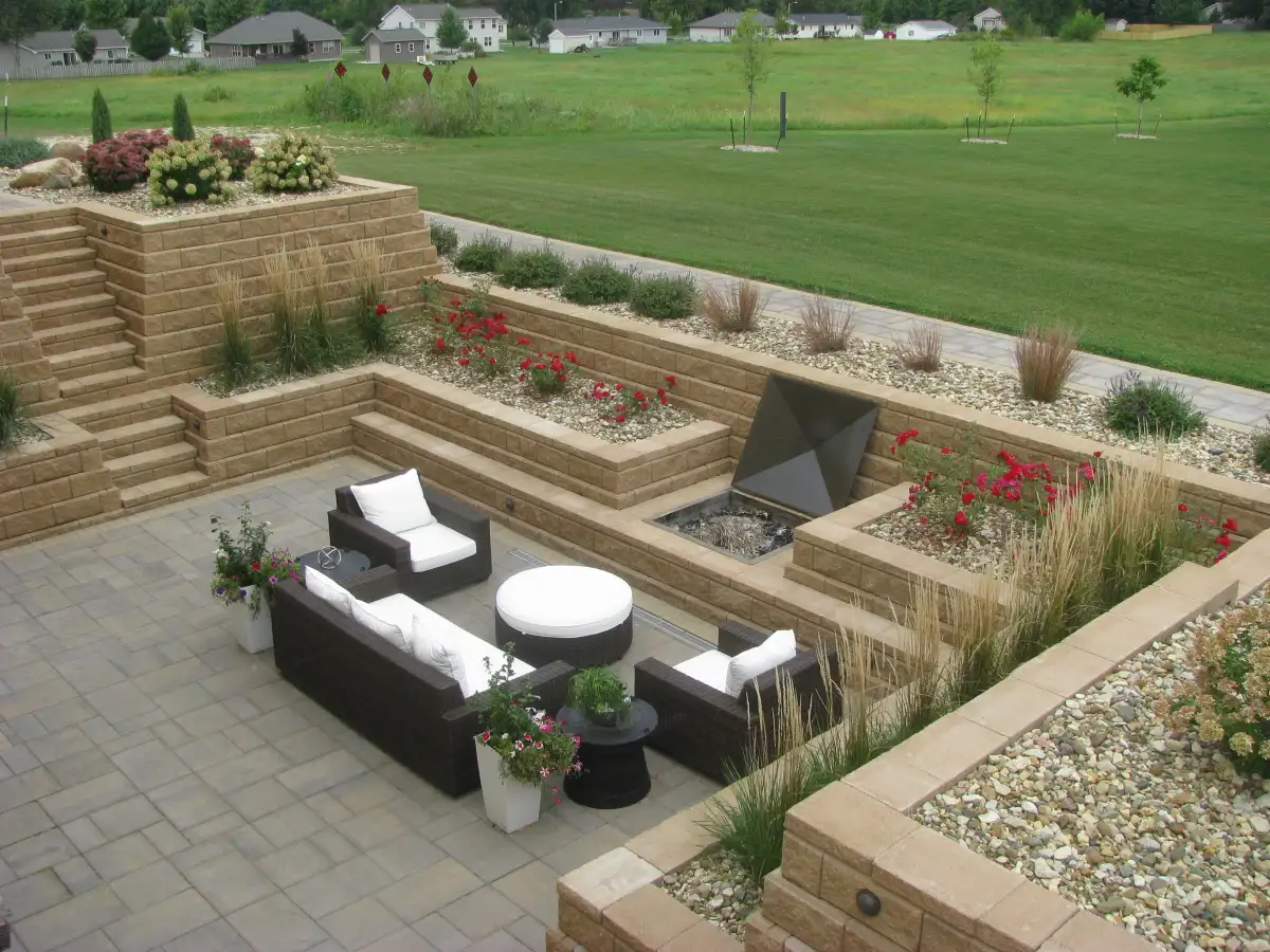 Paver patio with seating wall installed by Matthias Landscaping in Waterloo IA