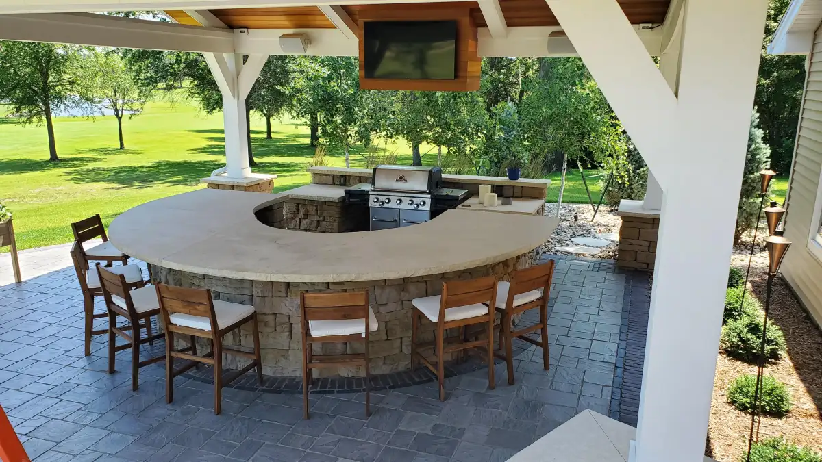 Built-in stainless steel grill in outdoor kitchen island